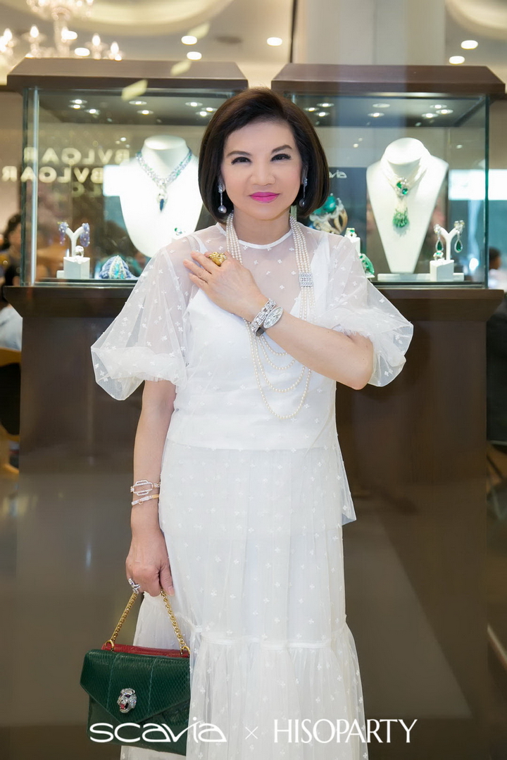 In Presenting an Exclusive Trunk Show